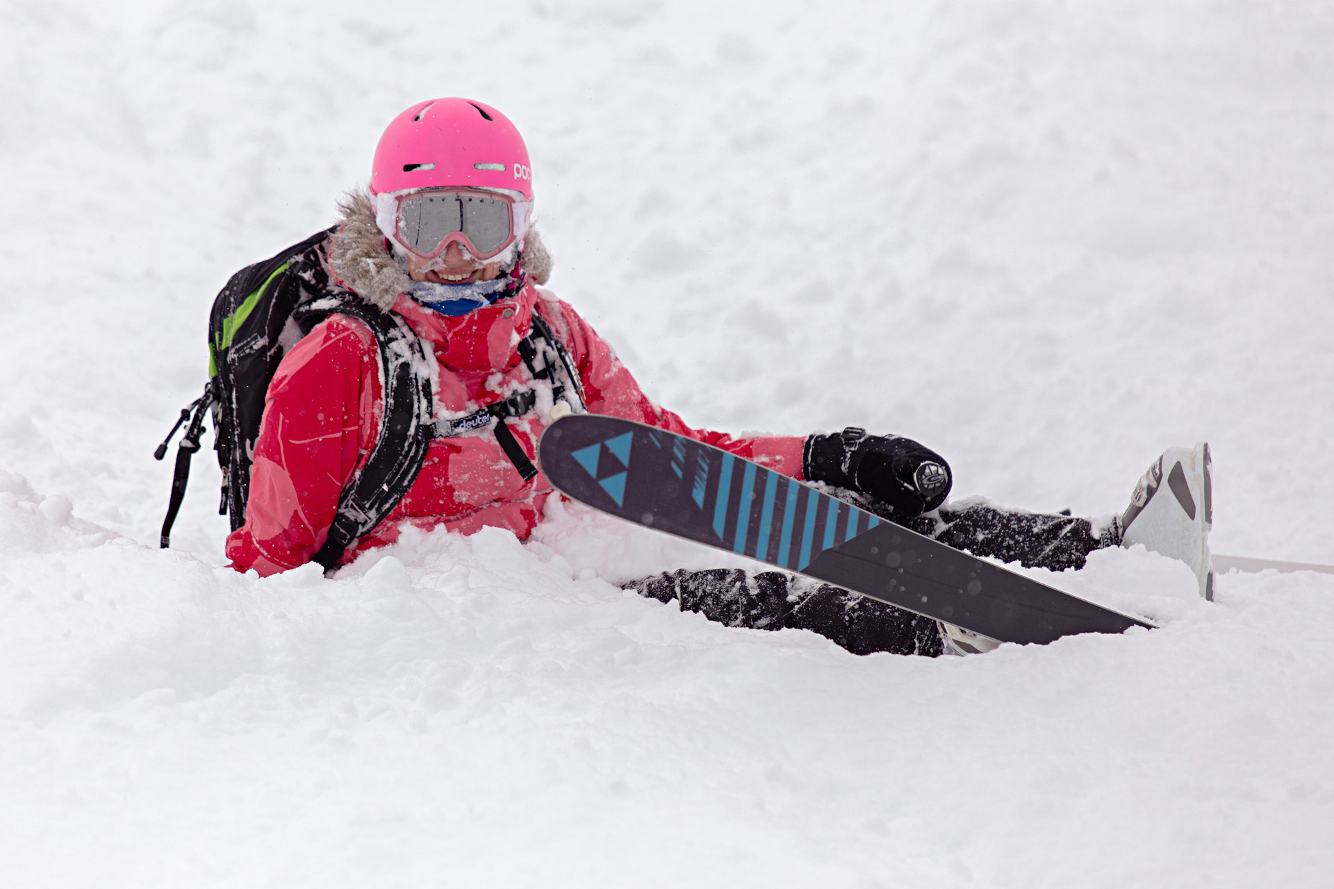 Skiers enjoying a guided backcountry ski trip in the Canadian mountains