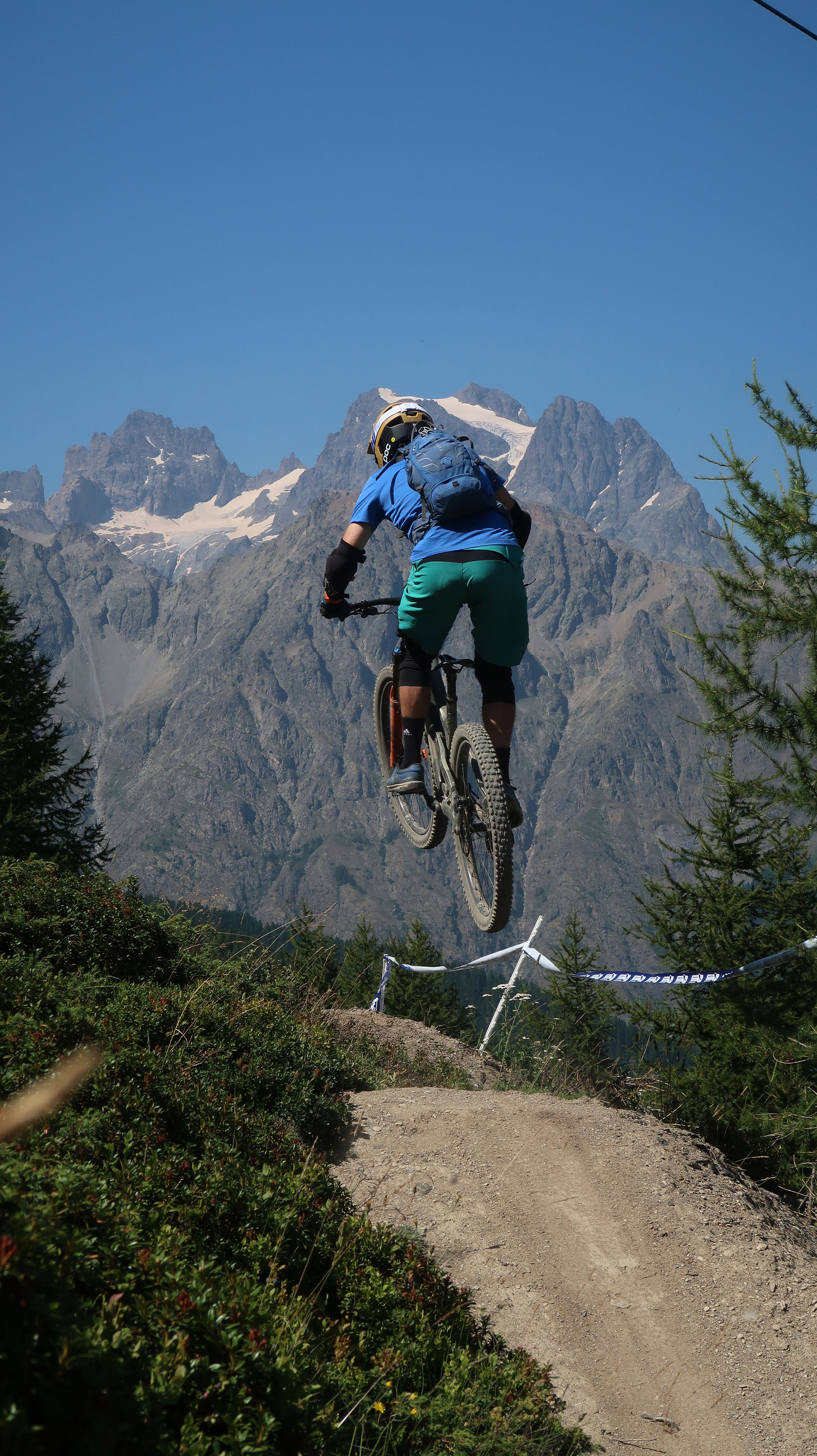 Mountain biker riding scenic trails in the Austrian Alps during a PerfectRide MTB trip